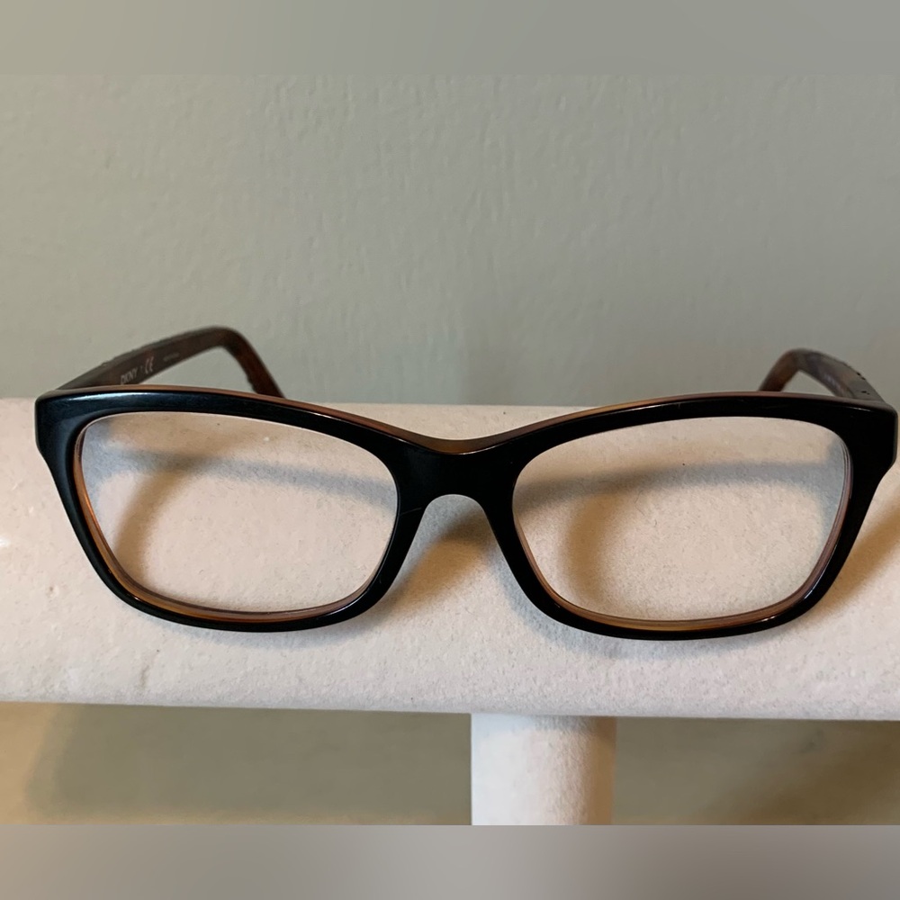 DKNY DY4649 eyeglasses, featuring a brown on tortoise brown  frame laser-etched